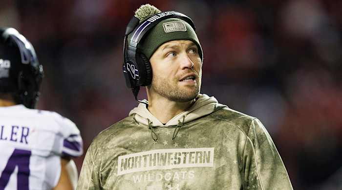 Northwestern interim coach David Braun looks on during the fourth quarter against Wisconsin.